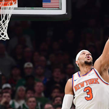 May 14, 2025; Boston, Massachusetts, USA; Boston Celtics guard Jaylen Brown (7) shoots the ball over New York Knicks guard Josh Hart (3) in the first half during game five of the second round for the 2025 NBA Playoffs at TD Garden. Mandatory Credit: Bob DeChiara-Imagn Images