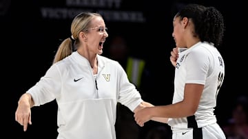 Vanderbilt head coach Shea Ralph talks with forward Khamil Pierre (12) during an NCAA college basketball game against Lipscomb Monday, Nov. 4, 2024, in Nashville, Tenn.