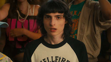 STRANGER THINGS (L to R) Gaten Matarazzo as Dustin Henderson, Finn Wolfhard as Mike Wheeler and Sadie Sink as Max Mayfield in STRANGER THINGS. Cr. Courtesy of Netflix © 2022