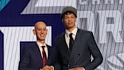 Jun 26, 2024; Brooklyn, NY, USA; Tidjane Salaun poses for photos with NBA commissioner Adam Silver after being selected in the first round by the Charlotte Hornets in the 2024 NBA Draft at Barclays Center. Mandatory Credit: Brad Penner-Imagn Images