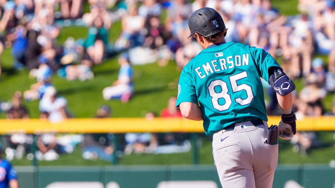 Mar 8, 2025; Mesa, Arizona, USA; Seattle Mariners infielder Colt Emerson (85) hits a home run in the top of the ninth during a spring training game against the Chicago Cubs at Sloan Park. Mandatory Credit: Allan Henry-Imagn Images