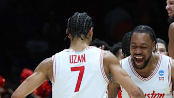 Mar 30, 2025; Indianapolis, IN, USA; Houston Cougars forward J'Wan Roberts (13) reacts with guard Milos Uzan (7) after the game against the Tennessee Volunteers in the Midwest Regional final of the 2025 NCAA tournament at Lucas Oil Stadium. Mandatory Credit: Trevor Ruszkowski-Imagn Images