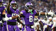 Dec 8, 2024; Minneapolis, Minnesota, USA; Minnesota Vikings linebacker Brian Asamoah II (6) celebrates his teams fumble recovery against the Atlanta Falcons during the fourth quarter at U.S. Bank Stadium. Mandatory Credit: Matt Krohn-Imagn Images