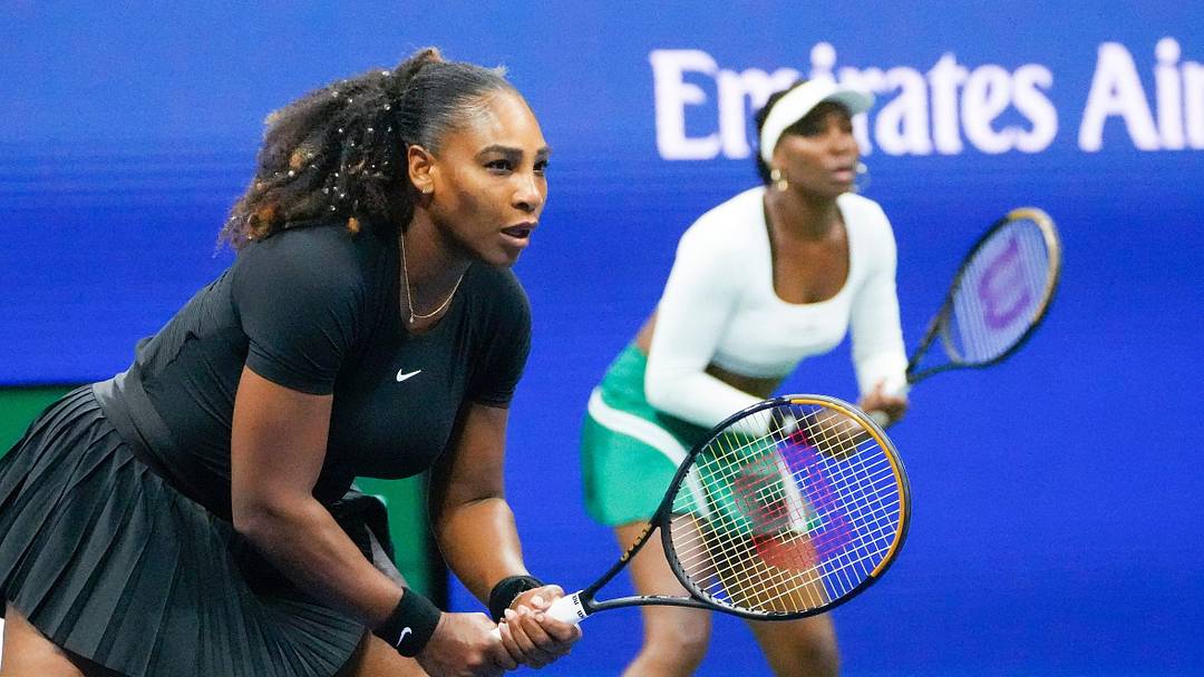 Serena Williams and Venus Williams of the USA play Lucie Hradecka and Linda Noskova of the Czech Republic in in women's doubles on day four of the 2022 U.S. Open tennis tournament at USTA Billie Jean King National Tennis Center.