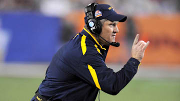 Jan 2, 2008; Glendale, AZ; USA; West Virginia Mountaineers defensive coordinator-linebackers coach Jeff Casteel gestures from the sidelines during 48-28 victory over the Oklahoma Sooners in the Fiesta Bowl at University of Phoenix Stadium. Mandatory Credit: Kirby Lee/Image of Sport-Imagn Images