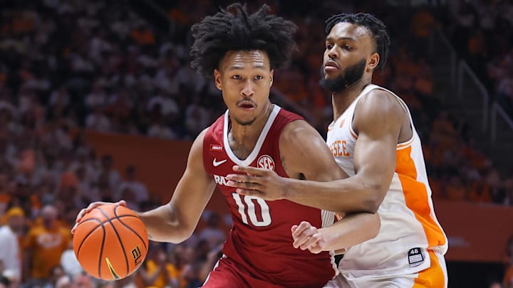 Arkansas Razorbacks forward Jaylin Williams (10) drives in against the Tennessee Volunteers during the second half at Thompson-Boling Arena. Arkansas Razorbacks forward Jaylin Williams (10) drives in against the Tennessee Volunteers during the second half at Thompson-Boling Arena.