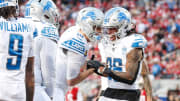 Detroit Lions running back Jahmyr Gibbs celebrates a touchdown against 49ers with quarterback Jared Goff 