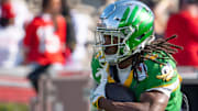 Oregon running back Noah Whittington carries the ball before the game as the Oregon Ducks face the Ohio State Buckeyes Wednesday, Jan. 1, 2025, in the quarterfinal of the College Football Playoff at the Rose Bowl in Pasadena, Calif.
