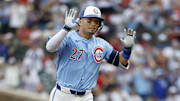 Chicago Cubs designated hitter Seiya Suzuki (27) rounds the bases after hitting a solo home run against the St. Louis Cardinals at Wrigley Field. 