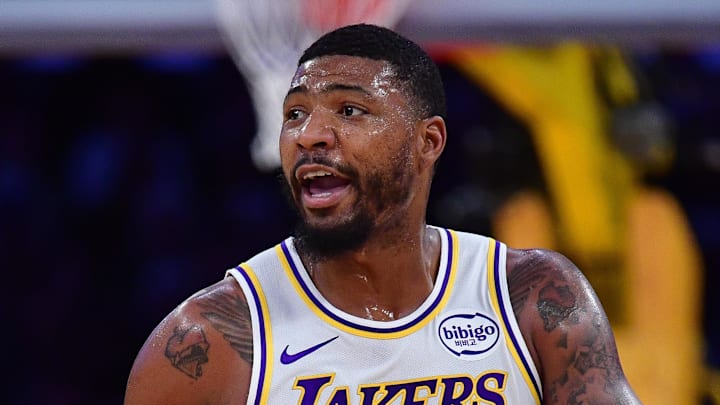 Dec 25, 2025; Los Angeles, California, USA; Los Angeles Lakers guard Marcus Smart (36) moves the ball up court against the Houston Rockets during the first half at Crypto.com Arena. Mandatory Credit: Gary A. Vasquez-Imagn Images