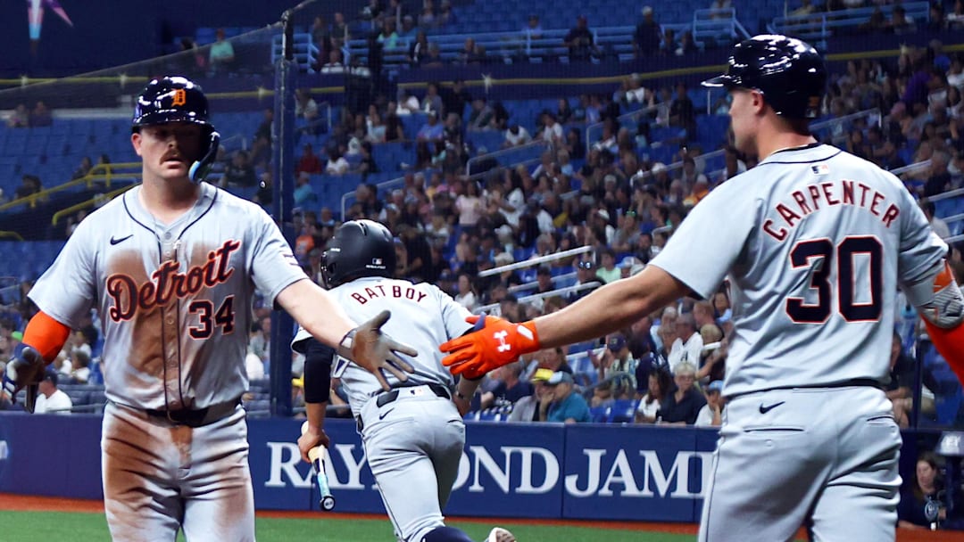 Jake Rogers is congratulated by Kerry Carpenter