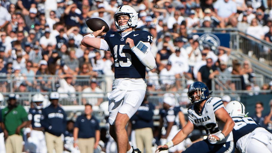 Penn State quarterback Drew Allar tosses a 31-yard touchdown pass to Kyron Hudson against Nevada.