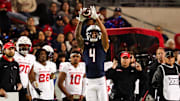 Nov 15, 2024; Tucson, Arizona, USA; Arizona Wildcats wide receiver Tetairoa McMillan (4) catches the ball during the third quarter against the Houston Cougars at Arizona Stadium. Mandatory Credit: Aryanna Frank-Imagn Images