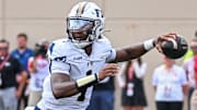 Aug 31, 2024; Bloomington, Indiana, USA;  Florida International Panthers quarterback Keyone Jenkins (1) throws a pass during the first half at Memorial Stadium. Mandatory Credit: Robert Goddin-Imagn Images