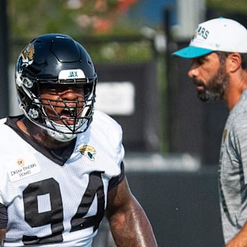 Jacksonville Jaguars defensive tackle Maason Smith (94) runs through tackling drills during the seventh organized team activity at the Miller Electric Center in Jacksonville, Fla. Monday, June 2, 2025. [Doug Engle/Florida Times-Union]