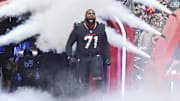 Dec 15, 2024; Houston Texans offensive tackle Tytus Howard (71) runs onto the field before the game against the Miami Dolphins at NRG Stadium. Mandatory Credit: Troy Taormina-Imagn Images