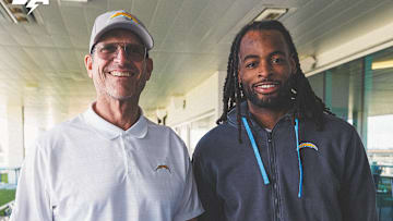 Jim Harbaugh and Najee Harris with Los Angeles Chargers