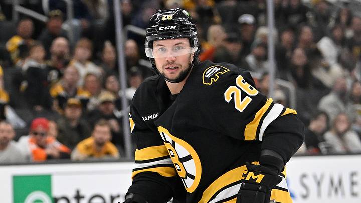 Sep 29, 2025; Boston, Massachusetts, USA; Boston Bruins defenseman Andrew Peeke (26) watches the puck during the third period against the Philadelphia Flyers at TD Garden. Mandatory Credit: Eric Canha-Imagn Images Sep 29, 2025; Boston, Massachusetts, USA; Boston Bruins defenseman Andrew Peeke (26) watches the puck during the third period against the Philadelphia Flyers at TD Garden. Mandatory Credit: Eric Canha-Imagn Images
