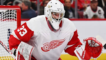 Oct 1, 2022; Chicago, Illinois, USA;  Detroit Red Wings goaltender Sebastian Cossa (33) defends the net against the Chicago Blackhawks at United Center. Mandatory Credit: Jamie Sabau-Imagn Images