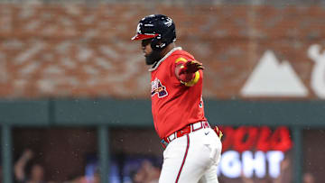 Jun 13, 2025; Cumberland, Georgia, USA; Atlanta Braves designated hitter Marcell Ozuna (20) celebrates hitting a home run against the Colorado Rockies during the seventh inning at Truist Park. Mandatory Credit: Jordan Godfree-Imagn Images
