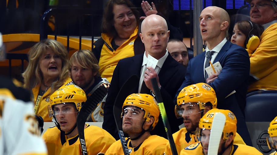 Dan Muse (right) talks with John Hynes during a 2020 Predators game. | Christopher Hanewinckel-Imagn Images