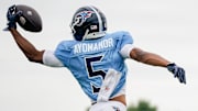 Tennessee Titans wide receiver Elic Ayomanor (5) makes a catch during an NFL football training camp practice at Ascension Saint Thomas Sports Park in Nashville, Tenn., Sunday, Aug. 3, 2025.