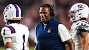 Sep 6, 2025; Columbia, South Carolina, USA; South Carolina State Bulldogs head coach Chennis Berry directs his team against the South Carolina Gamecocks in the first quarter at Williams-Brice Stadium. Mandatory Credit: Jeff Blake-Imagn Images