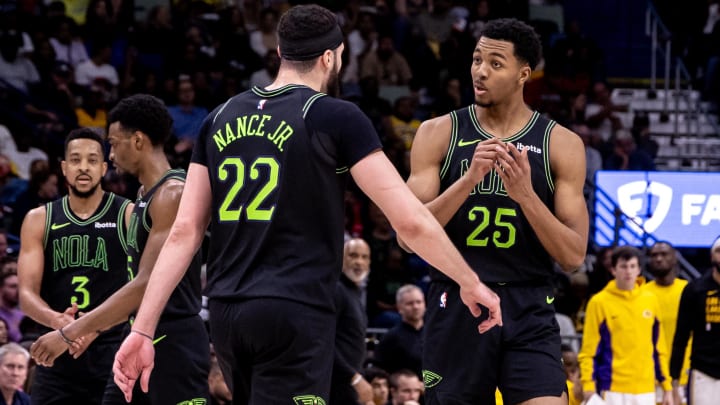 Apr 14, 2024; New Orleans, Louisiana, USA; New Orleans Pelicans guard Trey Murphy III (25) talks to forward Larry Nance Jr. (22) about a play against the Los Angeles Lakers during the second half at Smoothie King Center.