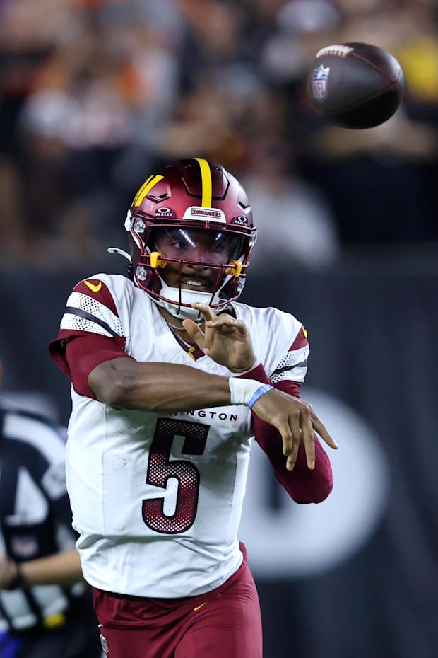 Washington Commanders quarterback Jayden Daniels throws during the fourth quarter against the Cincinnati Bengals Washington Commanders quarterback Jayden Daniels throws during the fourth quarter against the Cincinnati Bengals