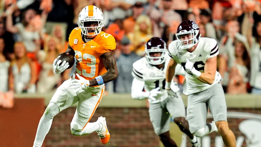 Nov 9, 2024; Knoxville, Tennessee, USA; Tennessee Volunteers defensive back Boo Carter (23) runs with the ball against the Mississippi State Bulldogs during the first half at Neyland Stadium. Mandatory Credit: Caitie McMekin/USA TODAY Network via Imagn Images
