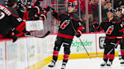 Mar 9, 2025; Raleigh, North Carolina, USA;  Carolina Hurricanes center Mark Jankowski (77) celebrates his goal against the Winnipeg Jets during the second period at Lenovo Center. Mandatory Credit: James Guillory-Imagn Images
