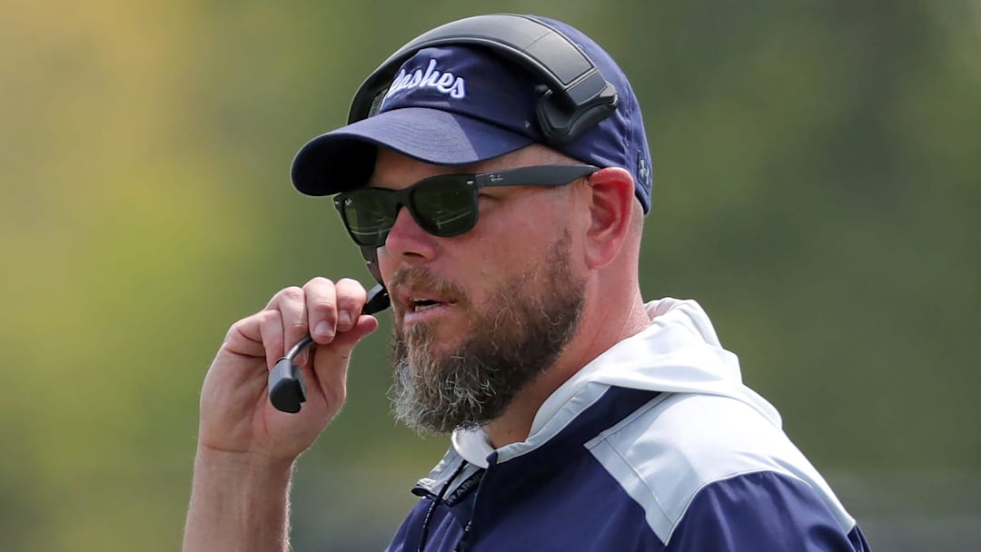 Kent State interim football coach Mark Carney watches during a football scrimmage at Dix Stadium, Saturday, Aug. 16, 2025, in Kent, Ohio.