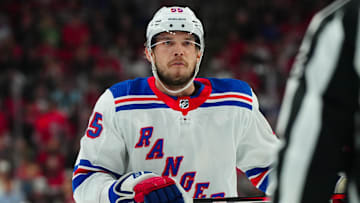 May 11, 2024; Raleigh, North Carolina, USA; New York Rangers defenseman Ryan Lindgren (55) reacts during the first period against the Carolina Hurricanes in game four of the second round of the 2024 Stanley Cup Playoffs at PNC Arena. Mandatory Credit: James Guillory-USA TODAY Sports