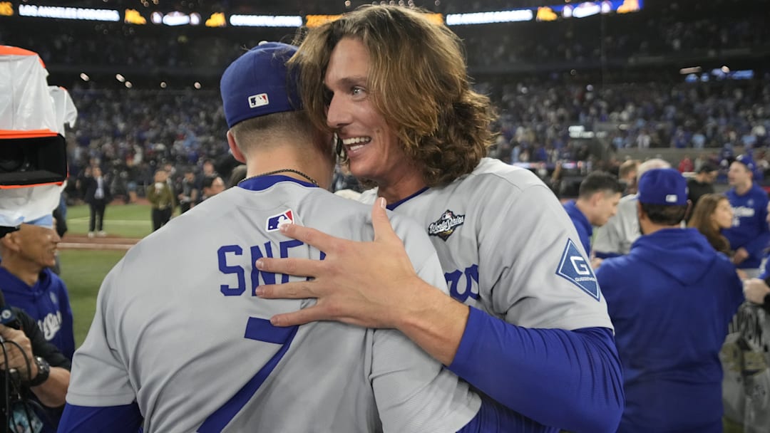 Oct 31, 2025; Toronto, Ontario, CAN; Los Angeles Dodgers pitcher Blake Snell (7) and pitcher Tyler Glasnow (31) celebrate after defeating the Toronto Blue Jays in the 2025 MLB World Series at Rogers Centre. Mandatory Credit: John E. Sokolowski-Imagn Images