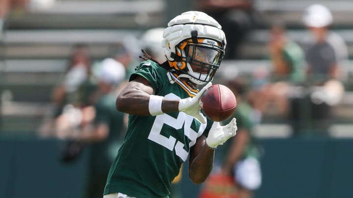 Green Bay Packers safety Xavier McKinney (29) runs through a drill on Friday at training camp.