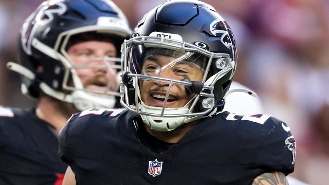 Dec 21, 2025; Glendale, Arizona, USA; Atlanta Falcons running back Tyler Allgeier (25) against the Arizona Cardinals at State Farm Stadium. 
