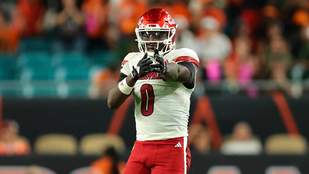 Oct 17, 2025; Miami Gardens, Florida, USA; Louisville Cardinals wide receiver Chris Bell (0) reacts after a carry against the Miami Hurricanes during the second quarter at Hard Rock Stadium. Mandatory Credit: Sam Navarro-Imagn Images