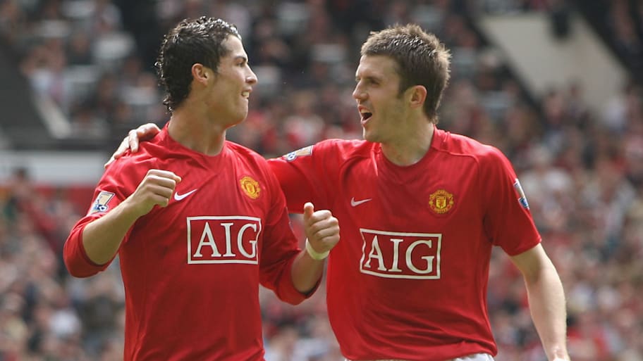 Cristiano Ronaldo (left) and Michael Carrick.