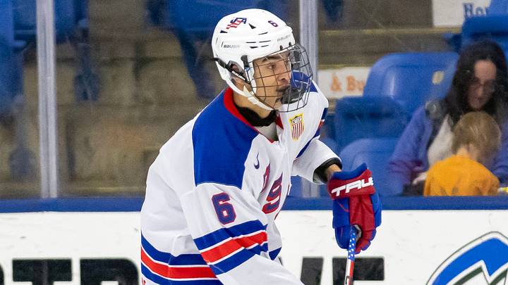 Feb 7, 2024; Plymouth, MI, USA; USA’s EJ Emery (6) passes the puck against Finland during the third period of the 2024 U18’s Five Nations Tournament at USA Hockey Arena. Mandatory Credit: David Reginek-USA TODAY Sports