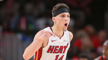Apr 9, 2024; Atlanta, Georgia, USA; Miami Heat guard Tyler Herro (14) reacts after a basket against the Atlanta Hawks in the second half at State Farm Arena. Mandatory Credit: Brett Davis-Imagn Images
