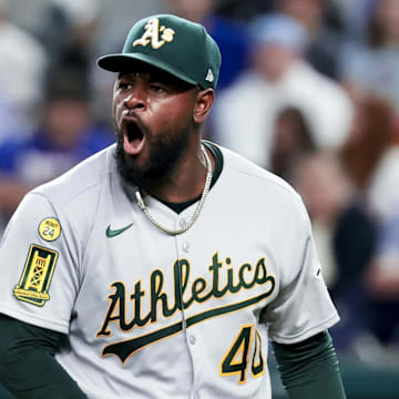 Apr 30, 2025; Arlington, Texas, USA;  Oakland Athletics starting pitcher Luis Severino (40) reacts during the third inning against the Texas Rangers at Globe Life Field
