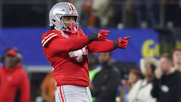 Ohio State Buckeyes defensive end JT Tuimoloau (44)