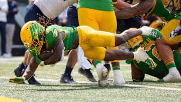 Oregon running back Noah Whittington dives into the end zone for a touchdown as the Oregon Ducks host the Montana State Bobcats on Aug. 30, 2025, at Autzen Stadium in Eugene, Oregon.