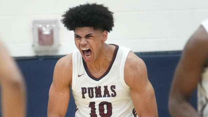 Perry Pumas forward Koa Peat (10) screams out after a dunk against the Basha Bears at Perry High School in Gilbert on Jan. 6, 2024.