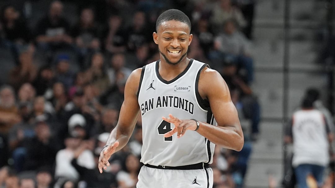 Mar 8, 2026; San Antonio, Texas, USA;  San Antonio Spurs guard De'aaron Fox (4) celebrates in the second half against the Houston Rockets at Frost Bank Center. Mandatory Credit: Daniel Dunn-Imagn Images