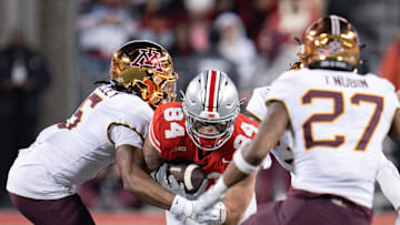 Nov 18, 2023; Columbus, Ohio, USA; 
Ohio State Buckeyes tight end Joe Royer (84) attempts to run past Minnesota Golden Gophers defensive back Justin Walley (5) during the second half of their game on Saturday, Nov. 18, 2023 at Ohio Stadium.