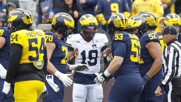 Apr 18, 2026; Ann Arbor, MI, USA; Michigan Wolverines quarterback Bryce Underwood (19) directs his teammates during the first half at Michigan Stadium. Mandatory Credit: Brian Bradshaw Sevald-Imagn Images