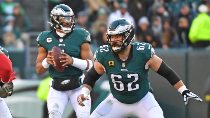 Dec 4, 2022; Philadelphia, Pennsylvania, USA; Philadelphia Eagles center Jason Kelce (62) blocks for  quarterback Jalen Hurts (1) against the Tennessee Titans at Lincoln Financial Field. 