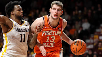 Feb 8, 2025; Minneapolis, Minnesota, USA; Illinois Fighting Illini center Tomislav Ivisic (13) works around Minnesota Golden Gophers guard Femi Odukale (11) during the second half at Williams Arena. Mandatory Credit: Matt Krohn-Imagn Images