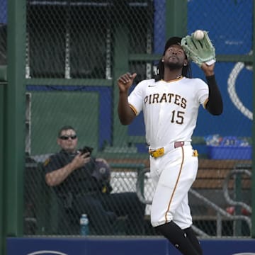 Sep 5, 2024; Pittsburgh, Pennsylvania, USA;  Pittsburgh Pirates center fielder Oneil Cruz (15) catches a ball hit by first baseman Juan Yepez (not pictured) for the third out of the second inning at PNC Park. Mandatory Credit: Charles LeClaire-Imagn Images